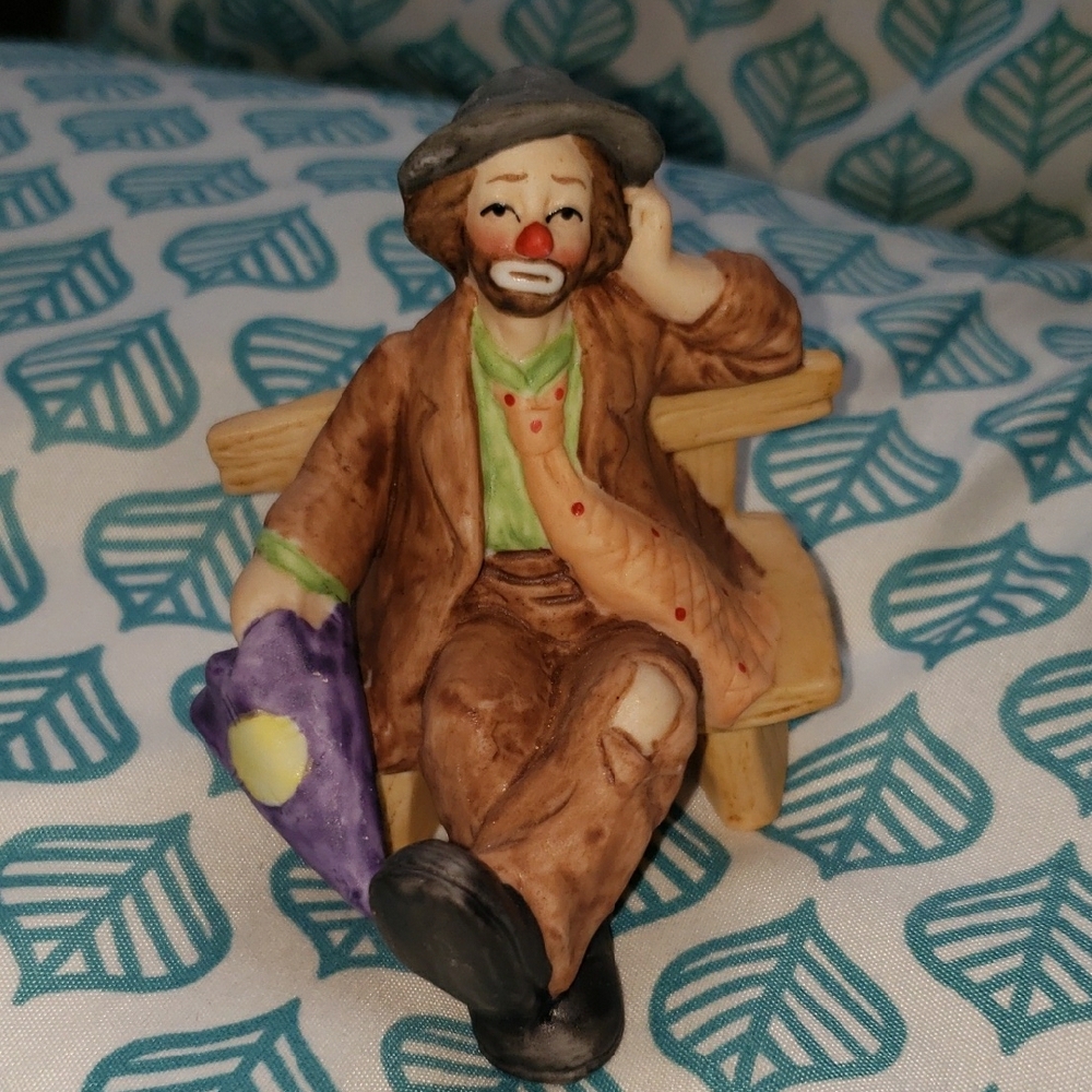 Charming Clown Figurine with Purple Umbrella